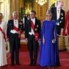 ROBERT HARDMAN: Riding with the Queen, Brigitte Macron blew movie star kisses at the crowd
