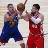 Jokic, Gordon fuel Nuggets' comeback to edge Clippers 112-110 in OT in teams' NBA playoff opener