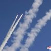 North Korea says leader Kim supervised missile tests simulating nuclear strikes against rivals