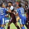 Getting shirty, lads! Mason Greenwood has his jersey RIPPED by Tyrone Mings as pair clash in tetchy pre-season showdown between Marseille and Aston Villa