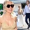 Sienna Miller, 43, brings boho chic to Centre Court as she puts on racy display in a plunging crop top and maxi skirt while cosying up to boyfriend Oli Green, 28 at Wimbledon day 14