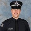 Australian police identify suspect in fatal shooting of officers as search enters second day
