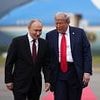 Lip reader reveals the tarmac whispers between Trump and Putin that hint at historic Ukraine deal: 'I'll help you'