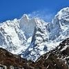 British climber is rescued from world's third highest mountain as doomed Himalayan expedition claims woman's life