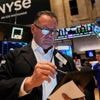 Asian shares trade higher after Wall Street climbs moderately as Fed holds rates steady