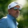 DeChambeau misses cut at US Open, then looks for answers in the rain