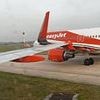 Airport chaos hits Britain yet again as planes 'clip wings' at Manchester Airport and stop ALL flights