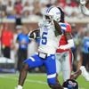 Austin Simmons throws 3 TD passes, No. 21 Mississippi routs Georgia State 63-7
