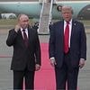 'I can't hear you!' Putin points to his ear when reporter asks if he'll 'stop killing civilians'