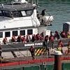 Labour accused of 'full-blown borders crisis' as first unescorted migrant boat reaches British shores in nearly three years