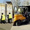 The cars smuggled out of Britain after being stolen to order: Moment shipping container hiding three pick-up trucks is intercepted by investigators as it made its way to Africa