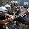 Greek riot cops clash with pro-Palestine supporters as Israeli cruise ship docks in Rhodes - days after protesters blocked its passengers from disembarking on another island