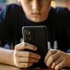 Children could be banned from social media for LIFE if they share classmates' nudes under new proposal