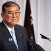 Japanese PM stays on to tackle high inflation, US tariffs despite a key election loss