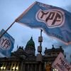 In a blow to Milei, a US judge orders Argentina to turn over its majority stake in state oil company