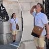 Adorable moment King's Guard horse leans into the frame as a blind tourist poses for photo - and is rewarded with a salute