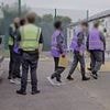 Moment small boat migrants are detained on first day of one-in, one-out deal with France - but critics say they will come straight back