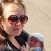Mother who got trapped headfirst in sea defence boulders drowned in front of daughter amid 'possible delay' to firefighters who were trying to rescue her, inquest told