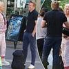 The man making Deb smile again! Deborra-Lee Furness beams as she cuddles up to a male companion in New York after her nasty split with Hugh Jackman