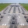 Trump's message to Putin and Xi: Largest US Air Force 'elephant walk' in modern history as Russian and Chinese dictators show of unity to undermine West in Moscow