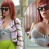 Braless Lily Allen shows off her new boob job in a see-through blue mesh top while celebrating her 40th birthday