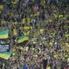 Télévision ou stade : le cœur des fans balance