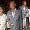 Joan Collins, 92, oozes sophistication in a chic white dress as she joins husband Percy Gibson, 60, at lavish dinner party in Saint-Tropez