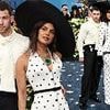 Nick Jonas seems to lose patience with wife Priyanka as her hat overshadows him on the Met Gala red carpet amid fan concern their relationship is on the rocks