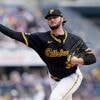 Skenes dominant into 8th, McCutchen hits go-ahead single as Pirates win 2-1 to sweep Phillies