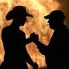 Firefighter is attacked as effigies of Kneecap burn along with 300 other bonfires across Northern Ireland ahead of Orange Order parades