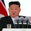 Kim Jong Un gives battle cry speech about winning 'anti-American' world war... after Trump boasted about their bromance