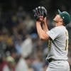Severino goes 8 strong innings for first win since signing big contract and A's top Brewers 3-1