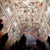 Vatican firefighters install chimney on roof of the Sistine Chapel for papal election