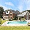 Sir Mo Farah slashes price of £6million Surrey mansion by seven-figure sum in the hopes of making a speedy sale
