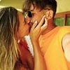 Zara McDermott locks lips with boyfriend Louis Tomlinson as the pair pack on the PDA and officially 'hard launch' their relationship on social media