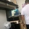 Moment prisoner brags about his luxurious surroundings behind bars as inmates hoard speakers, TVs, Nike shoes and even Big Ben model clocks