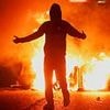 Riots spread in Northern Ireland with 15 arrested after nights of chaos following 'sexual assault of girl by Romanian teens' in Ballymena - as terrified foreign nationals consider fleeing
