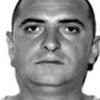 Albania's most wanted pimp left to free walk the streets in Britain - despite losing extradition battle FOUR years ago