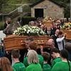 Mother 'full of kindness and warmth' and her two 'vibrant' children were killed 'in unspeakable way', priest tells mourners after 'husband killed all three and turned gun on himself'