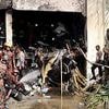 At least 20 dead and more than 170 rescued after Air Force training plane smashed into school in Bangladesh