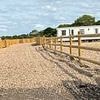 'Land-grabbing' travellers were 'lucky not to have caused a train crash' after using huge diggers to build an 'illegal' camp feet away from a major high-speed railway line, expert says