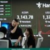 Asian shares mostly gain after big tech rally on Wall Street