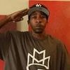 50 Cent's rapper friend Bang Em Smurf is staying in a taxpayer-funded UK asylum hotel - after being jailed over a shootout in the US