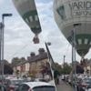 Luchtballon stort bijna neer op woonwijk, voorbijganger brengt in extremis redding