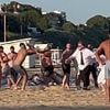Too hot for some! Sunworshippers trade blows in Bournemouth beach brawl as bouncers struggle to contain the violence