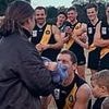 Footy star celebrates 200th game milestone with proposal for the ages -'had to make sure we got the win first'