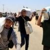 Palestinians say local gunmen and Israeli forces opened fire near Gaza aid site