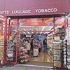 Moment police raiding Oxford Street candy store find secret underground tunnel where staff fled after tourist charged £899 for TWO pack of sweets