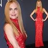 Nicole Kidman stuns in a red lace gown as she receives the 2025 Kering Women In Motion Award at ceremony during Cannes Film Festival