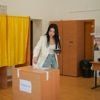 Romanians vote in a presidential redo after voided election sparked deep political crisis
